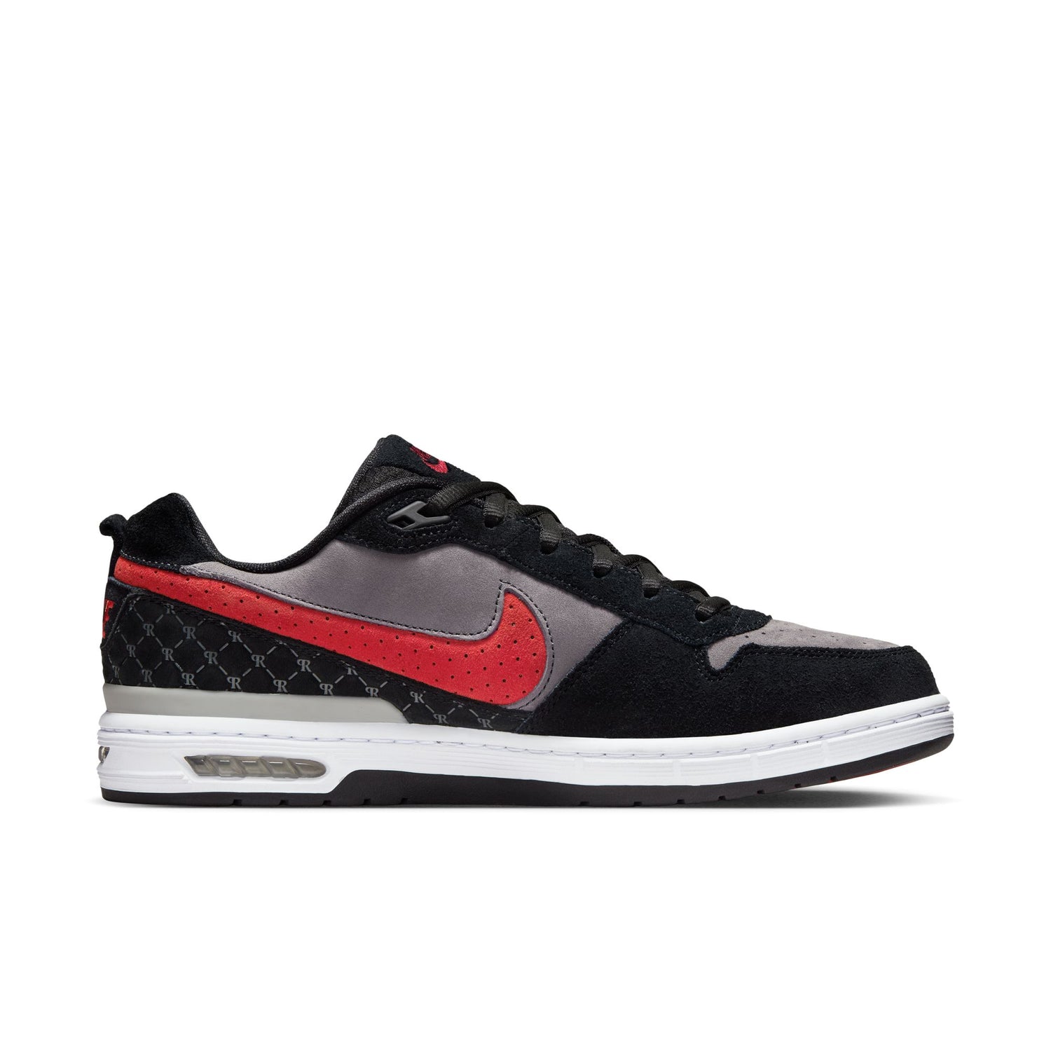 Black and red sneaker with a white sole on a white background