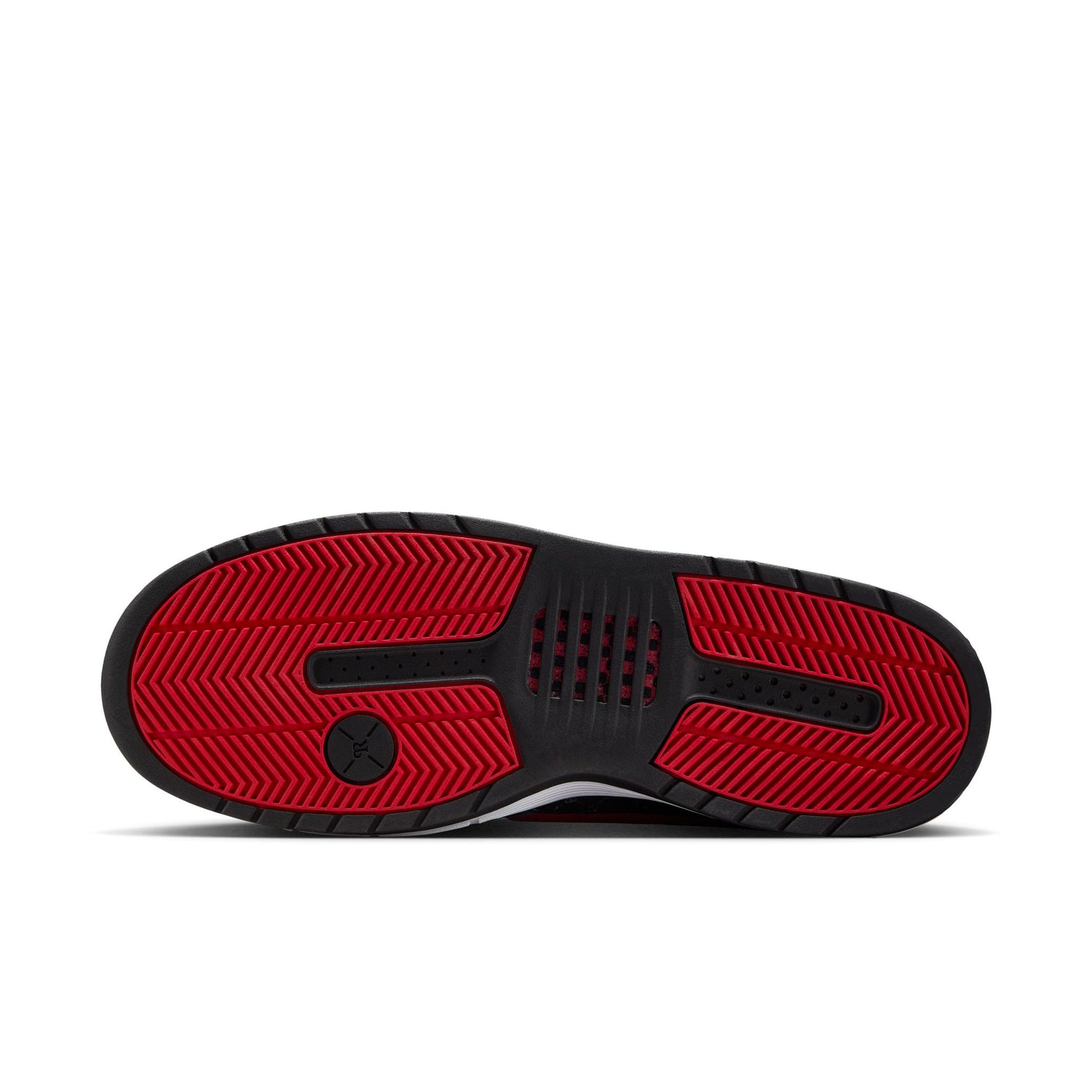 Red and black sole of a shoe on a white background